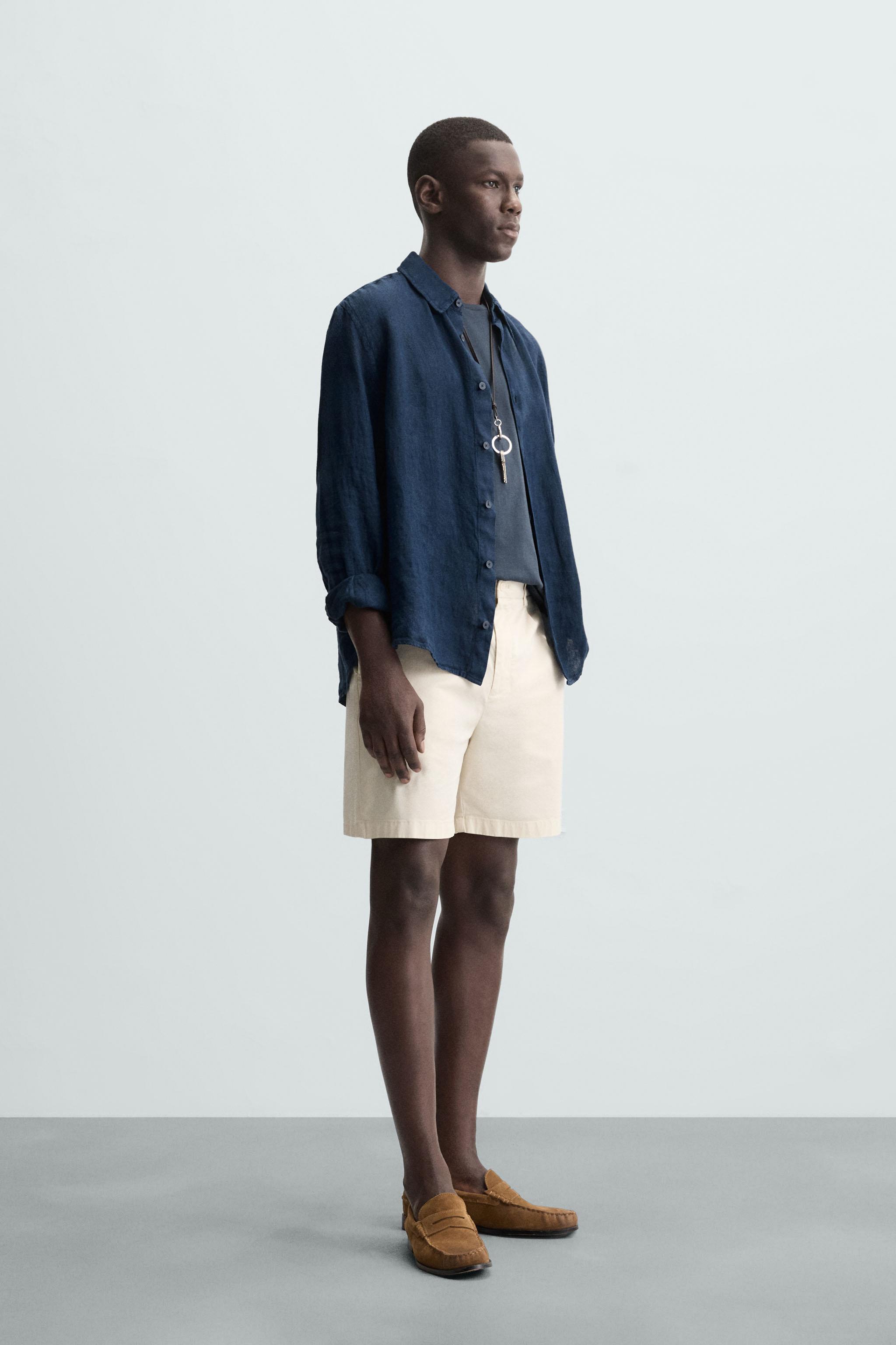 REGULAR FIT PLEATED BERMUDA SHORTS
